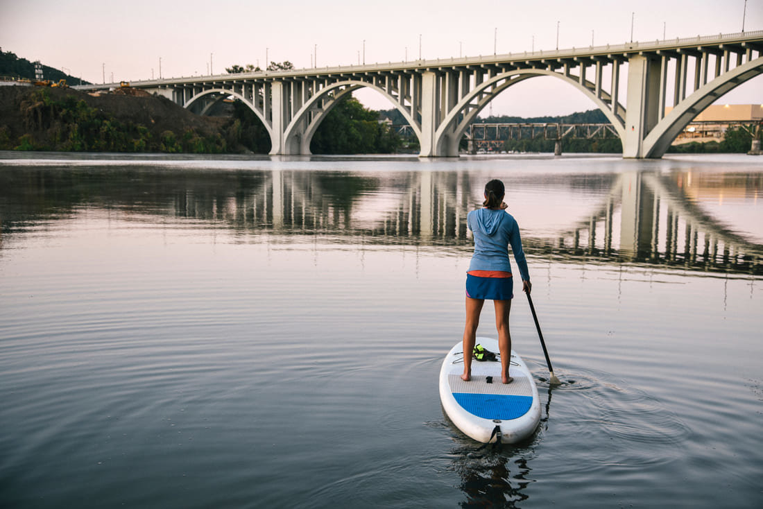 Stand-up paddler on the Tennessee River in Knoxville, Tennessee